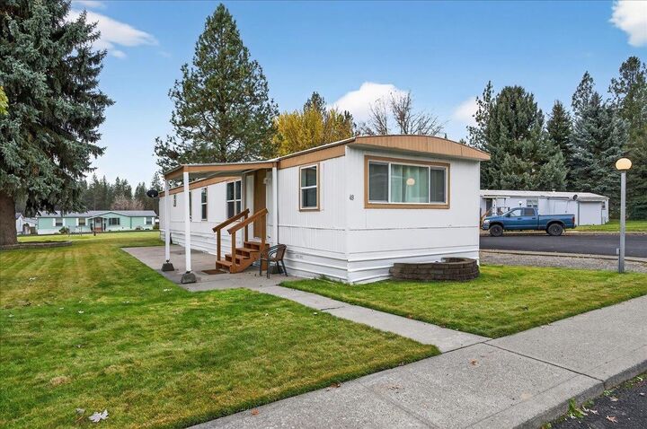 Property Photo:  3110 E Chattaroy Rd 48  WA 99003 