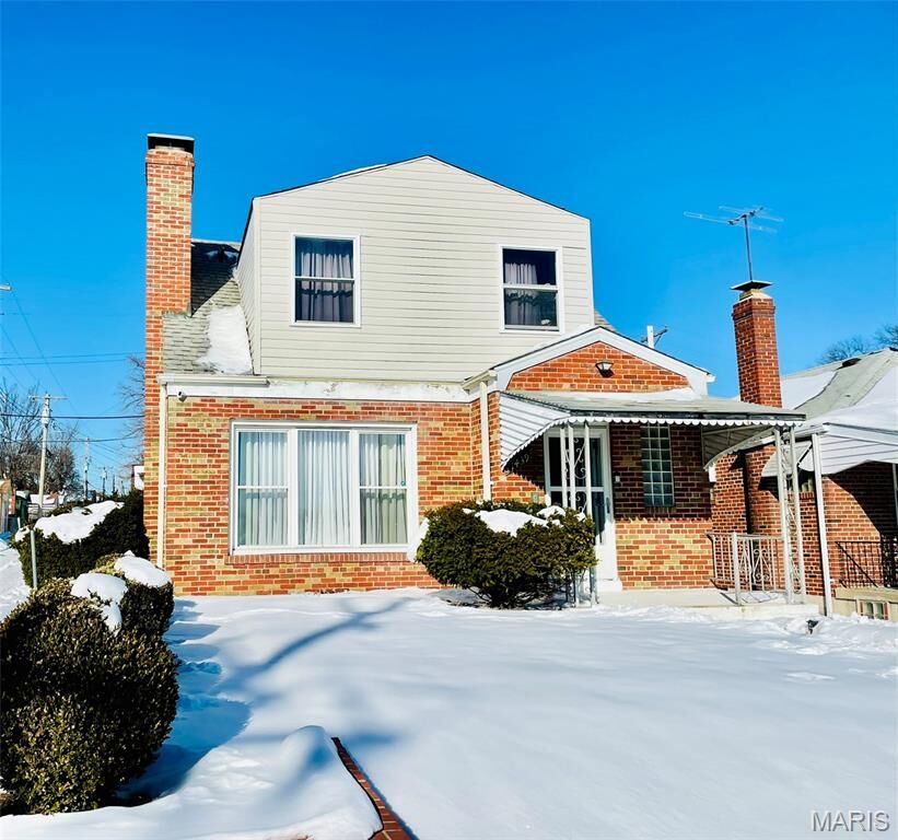 Property Photo:  1439 McLaran Avenue  MO 63147 