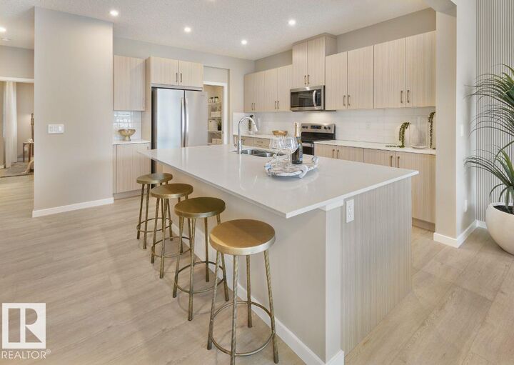 Property Photo:  8727 224 Street NW  AB T5T 7W6 