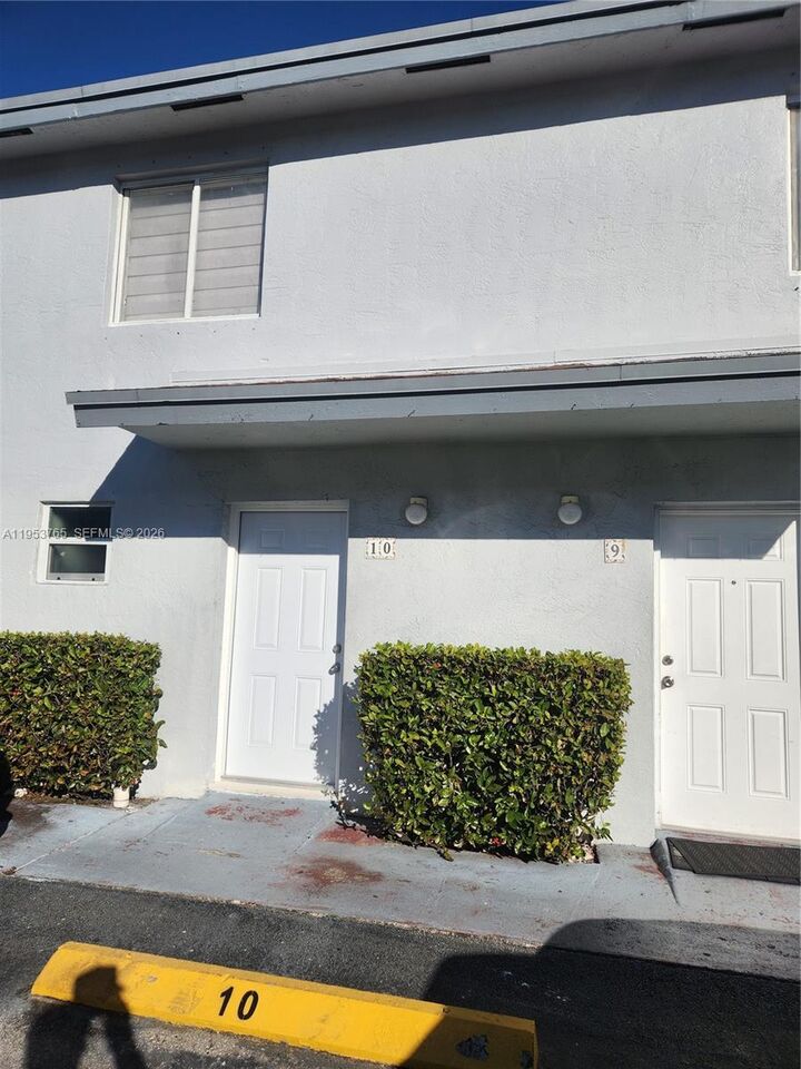 Property Photo:  8025 NW 8th St 10  FL 33126 