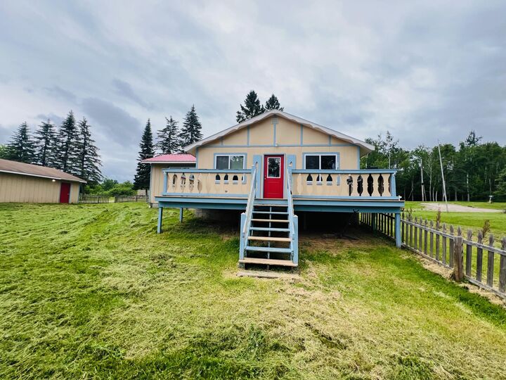 Property Photo:  6637 Forsyth Drive  MI 49721 
