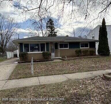 Property Photo:  3815 Walton Drive  MI 48910 