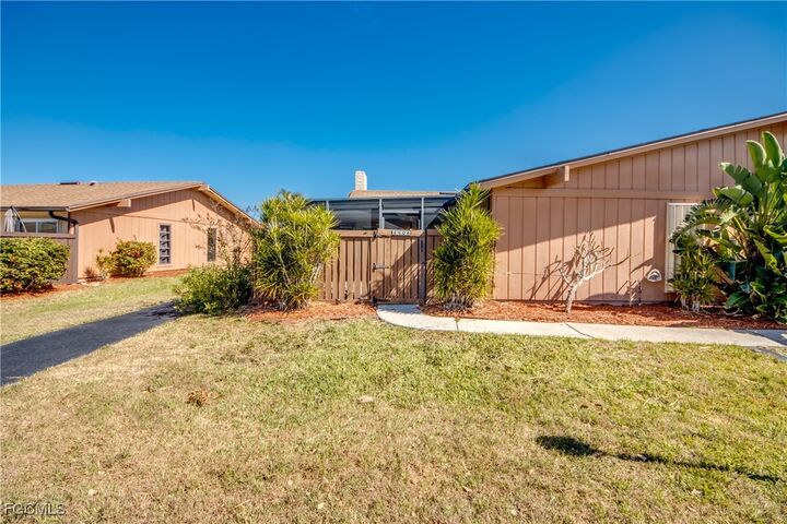 Property Photo: 6406 Royal Woods Drive FL 33908