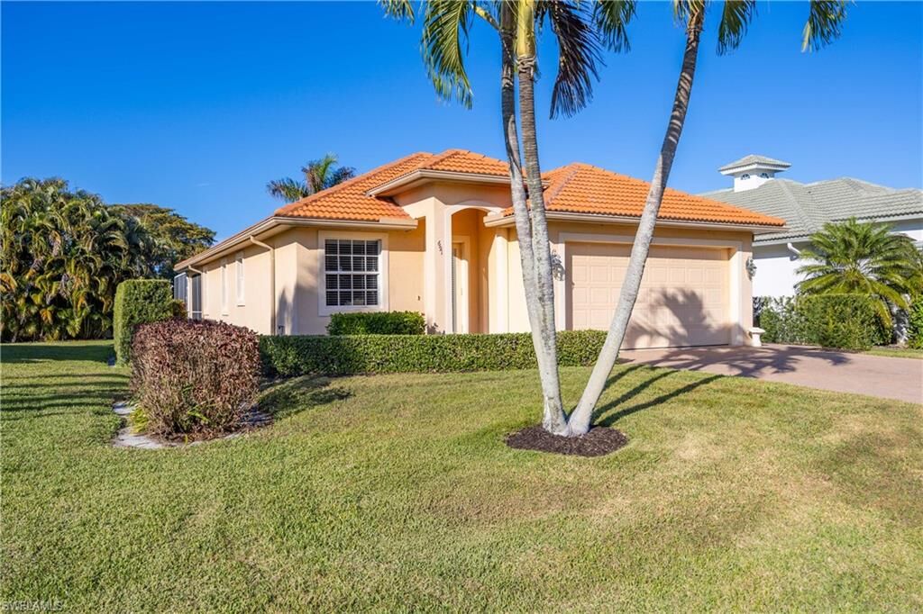 Property Photo:  691 92nd Ave N  FL 34108 