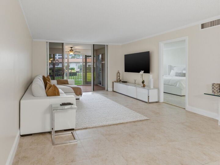 Property Photo:  911 Gardenia Drive E 150  FL 33483 