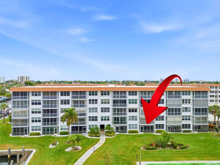 Property Photo:  911 Gardenia Drive E 150  FL 33483 