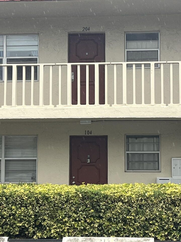 Property Photo:  21 Abbey Lane 104  FL 33446 