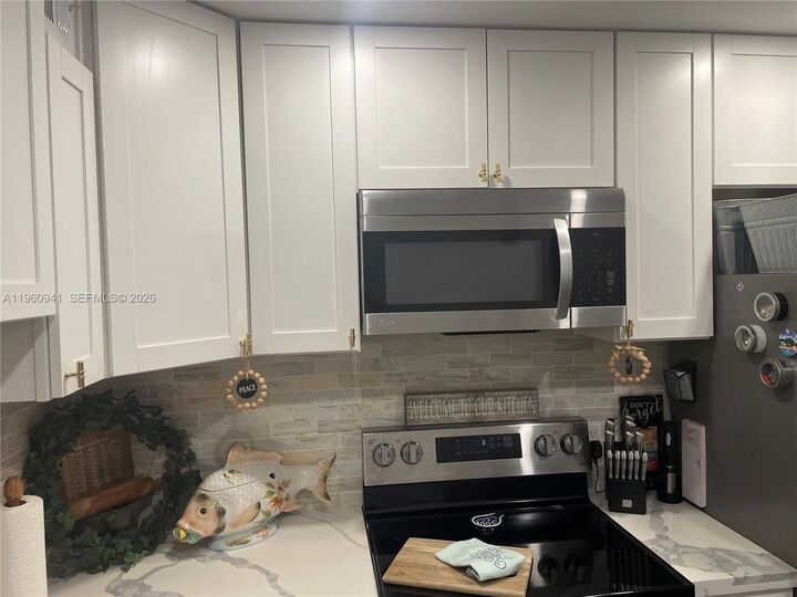 Property Photo:  1401 SW 134th Way 305C  FL 33027 