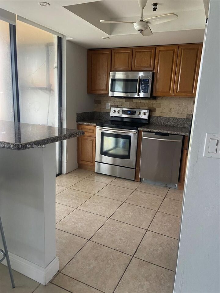 Property Photo:  665 NE 195th St 119  FL 33179 