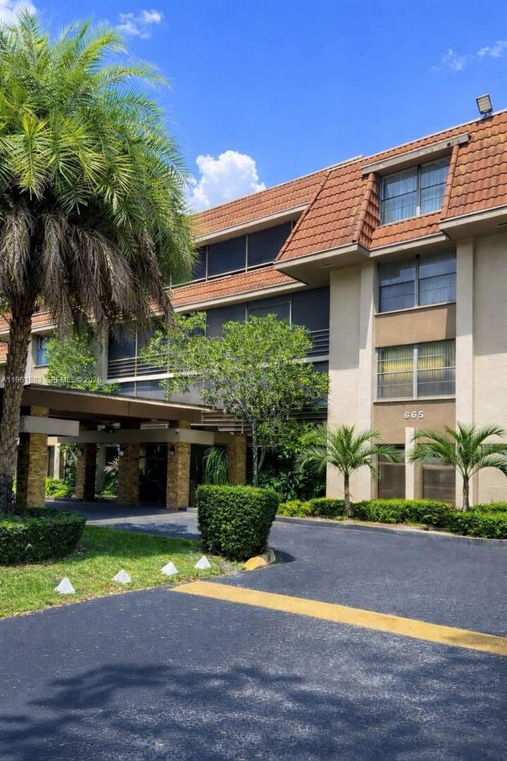 Property Photo:  665 NE 195th St 119  FL 33179 