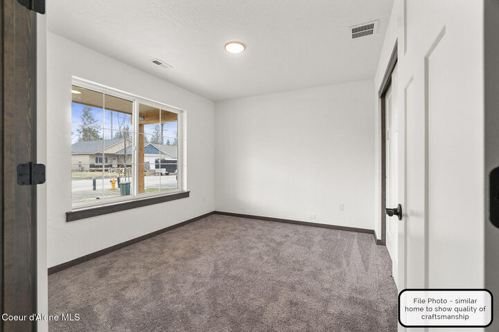 Property Photo:  8966 W Swather Ave  ID 83858 