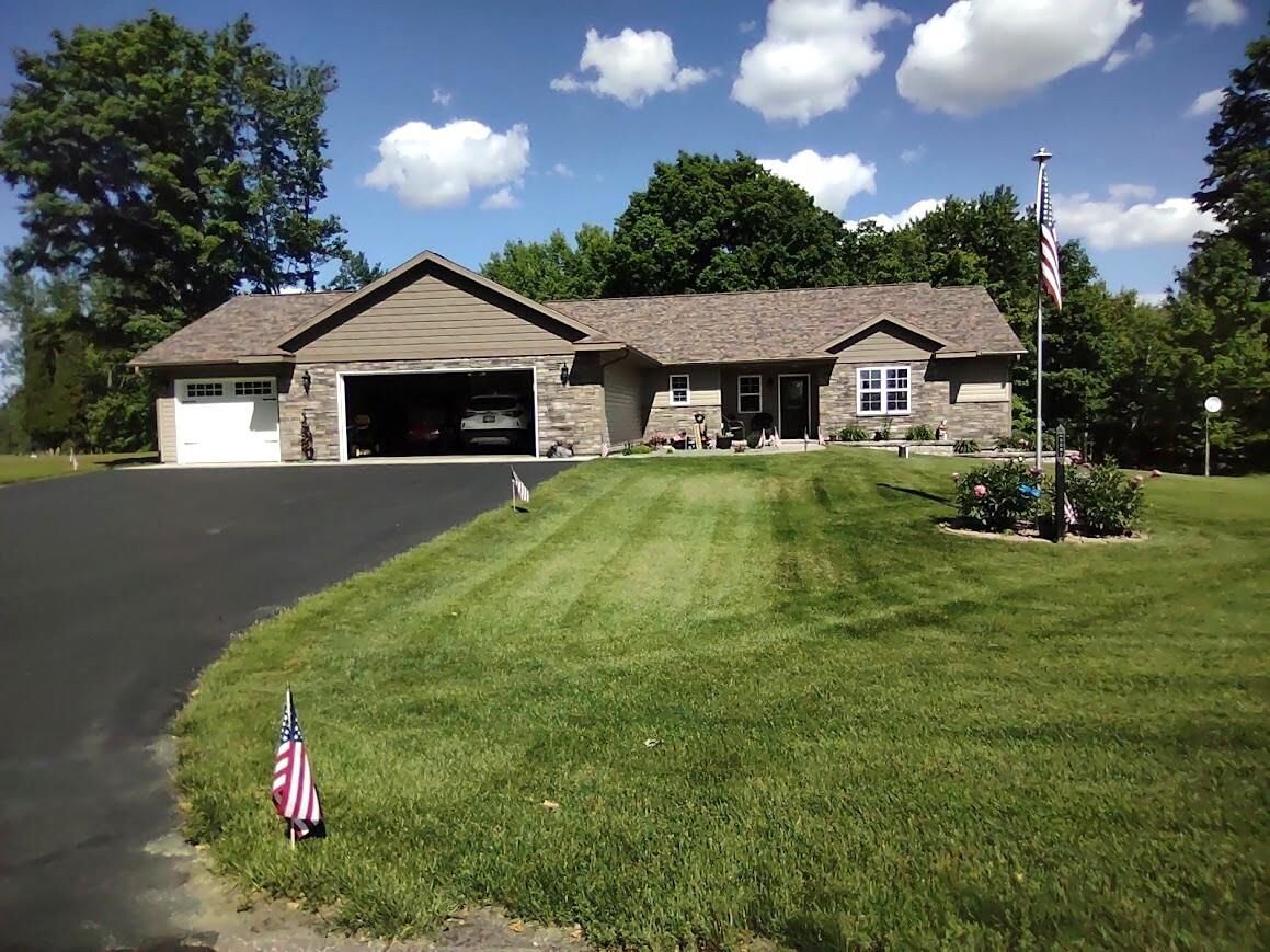Property Photo:  N3061 River Trace Road  WI 54409 