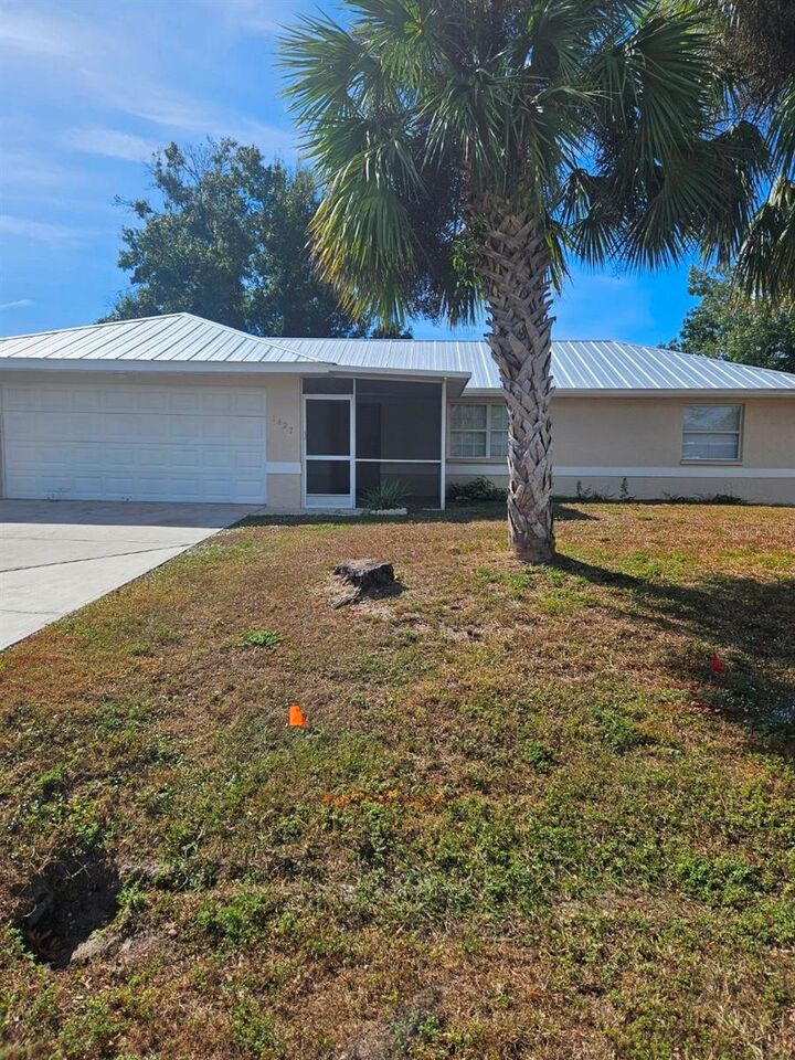 Property Photo: 1427 Hayworth Road FL 33952
