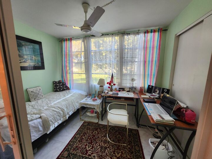 Property Photo:  2400 NE 1st Lane 206  FL 33435 