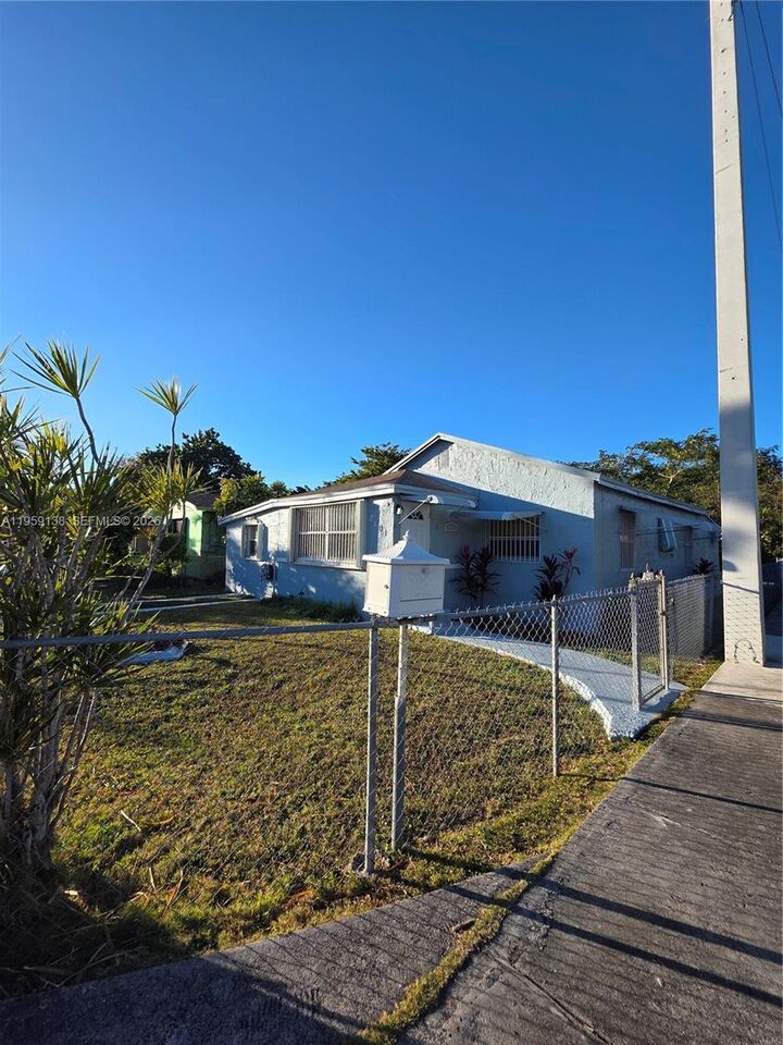 Property Photo:  2401 NW 56th St  FL 33142 