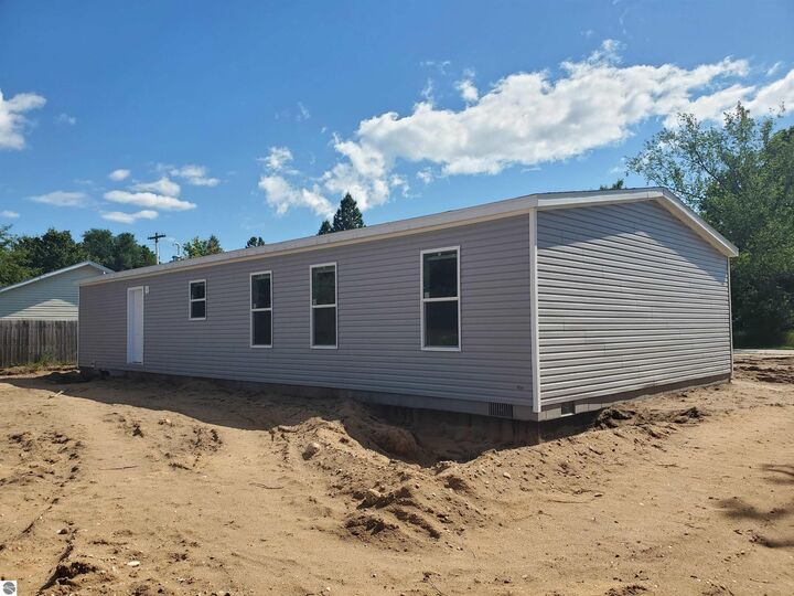 Property Photo:  8916 NW Valley  MI 49676 