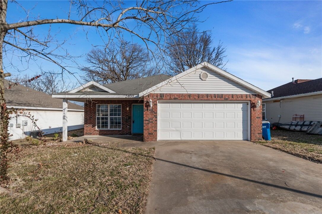 Property Photo:  2400 SW Choctaw Street  AR 72712 