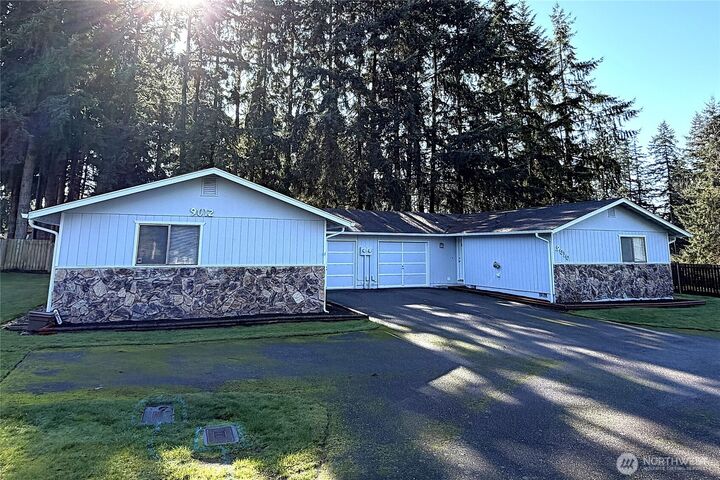 Property Photo:  9012  47th Avenue E  WA 98446 