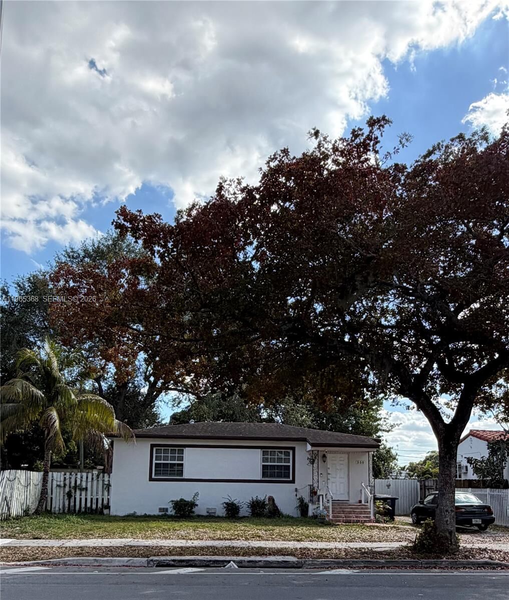 Property Photo:  550 NW 135th St  FL 33168 