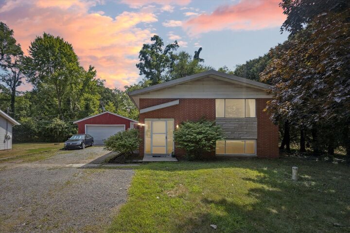 Property Photo:  7039 Curtis Drive  MI 49038-9521 