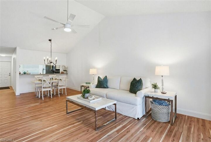 Property Photo:  5654 Woodmere Lake Cir C203  FL 34112 