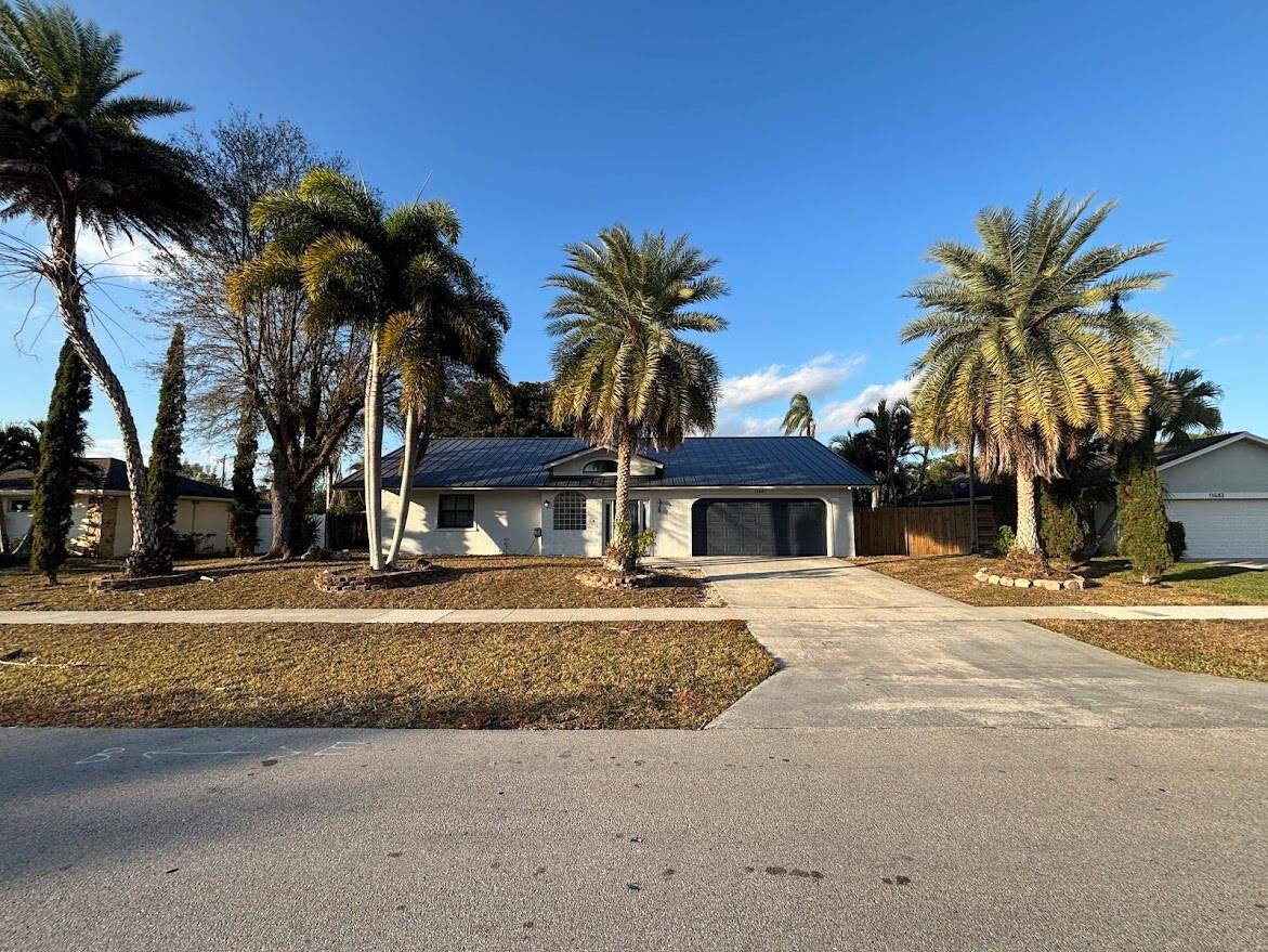 Property Photo:  11681 Turnstone Drive  FL 33414 