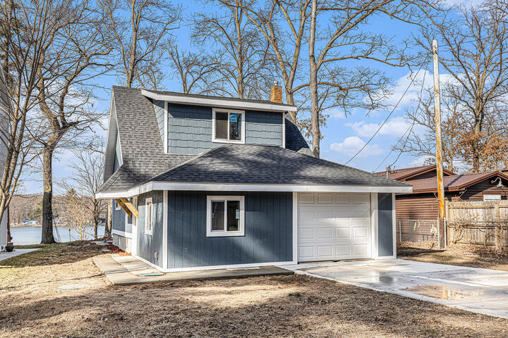 Property Photo:  5557 Front Street  MI 49337 