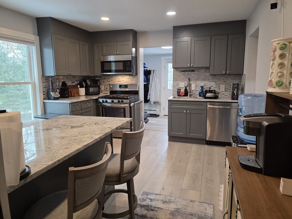 Property Photo:  1081 Main Street L  MA 01801 