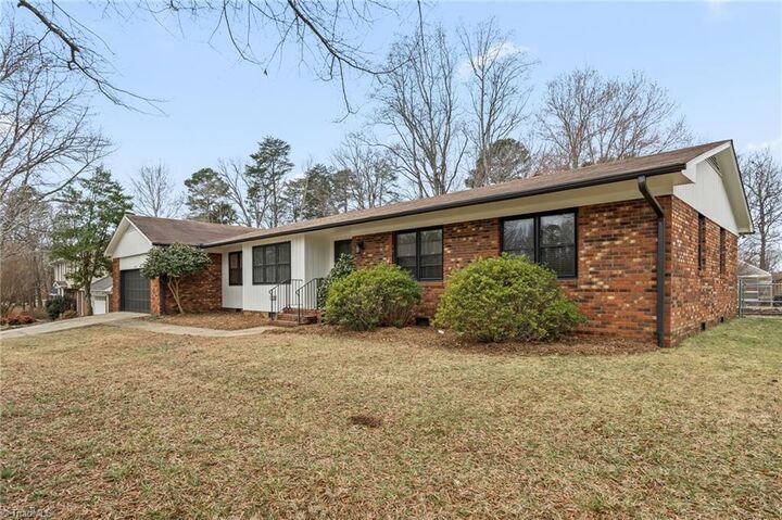 Property Photo:  4109 Oak Hollow Drive  NC 27265 