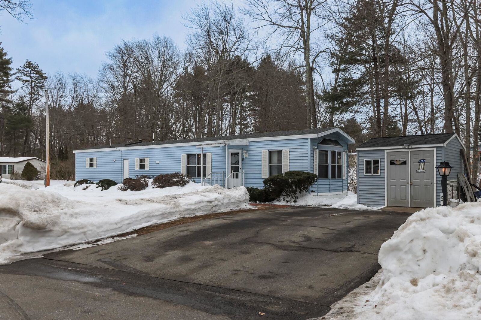Property Photo:  25 Village Drive  NH 03077 