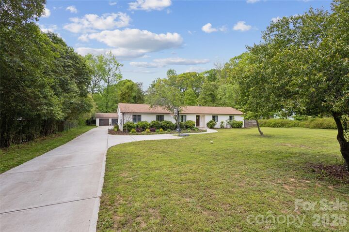 Property Photo:  7200 Monroe Road  NC 28212 