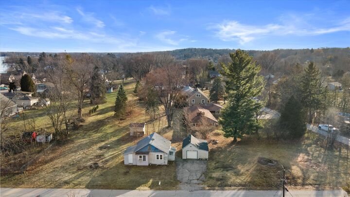 Property Photo:  S67w18711 Emerald Dr  WI 53150 