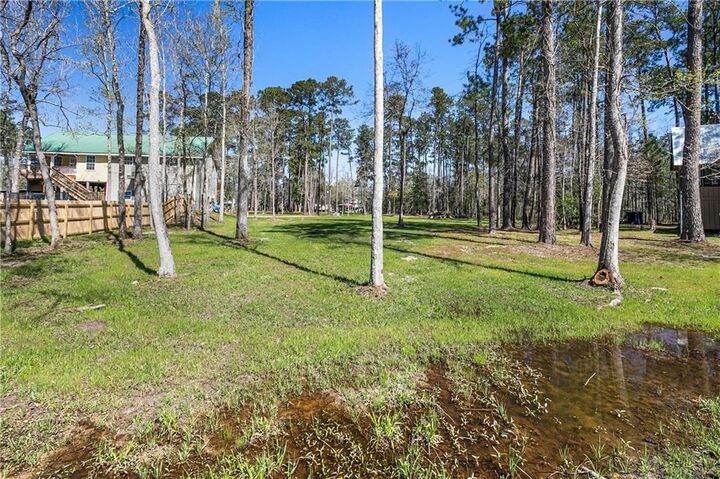Property Photo:  Piney Woods Court  LA 70433 