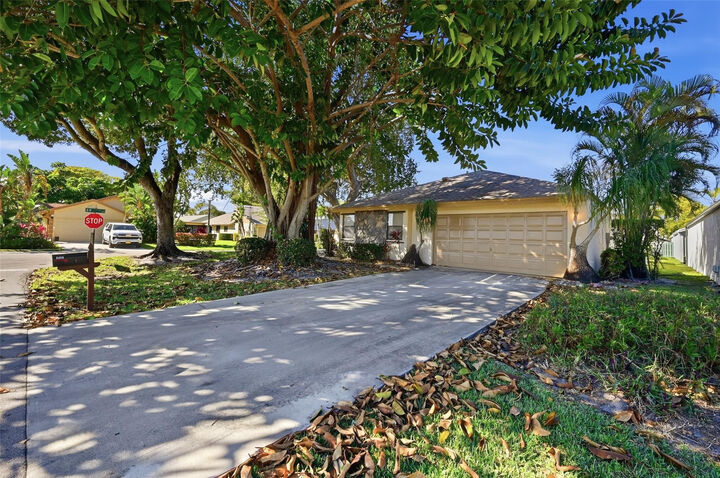 Property Photo:  2495 NW 14th Street  FL 33445 