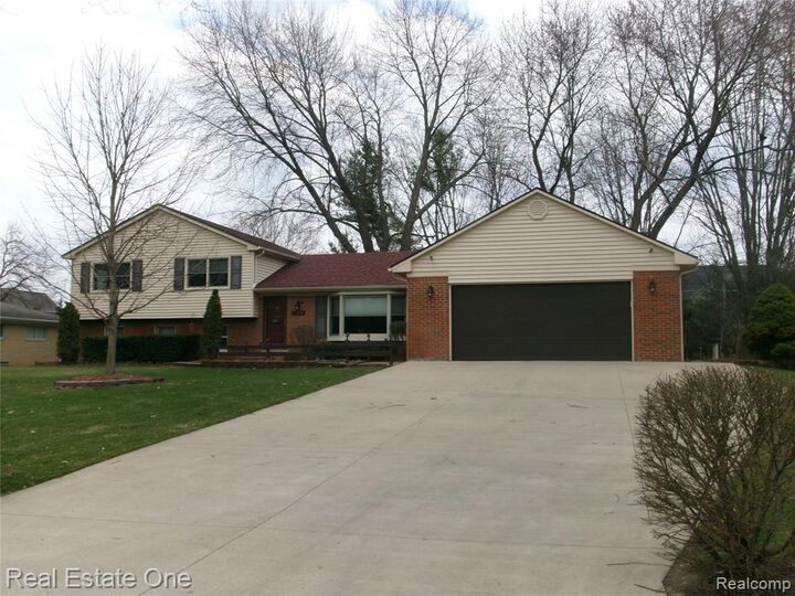 Property Photo:  23918 Forest Park Drive  MI 48374 3415 