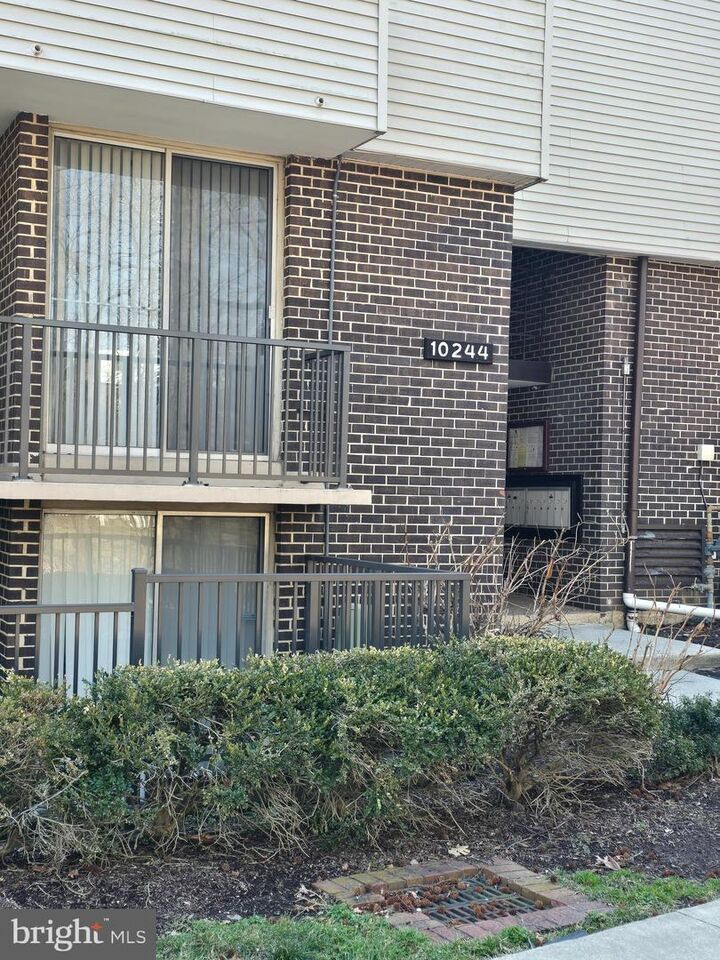 Property Photo:  10244 Prince Place 21-202  MD 20774 