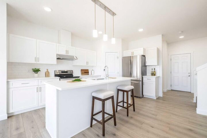 Property Photo: 312 Edgefield Close AB T1P 2H9