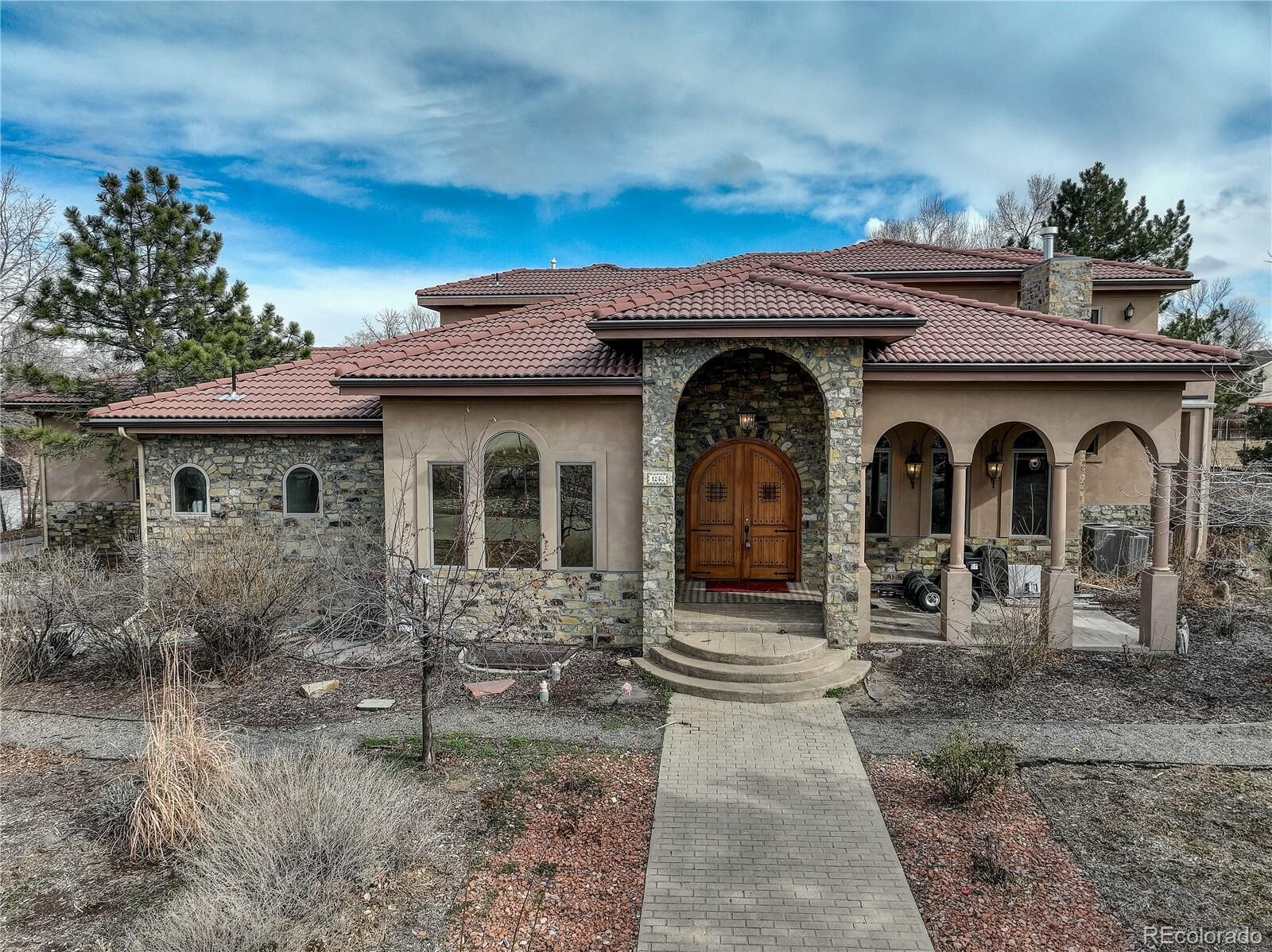 Property Photo: 1240 S Xenia Street CO 80247