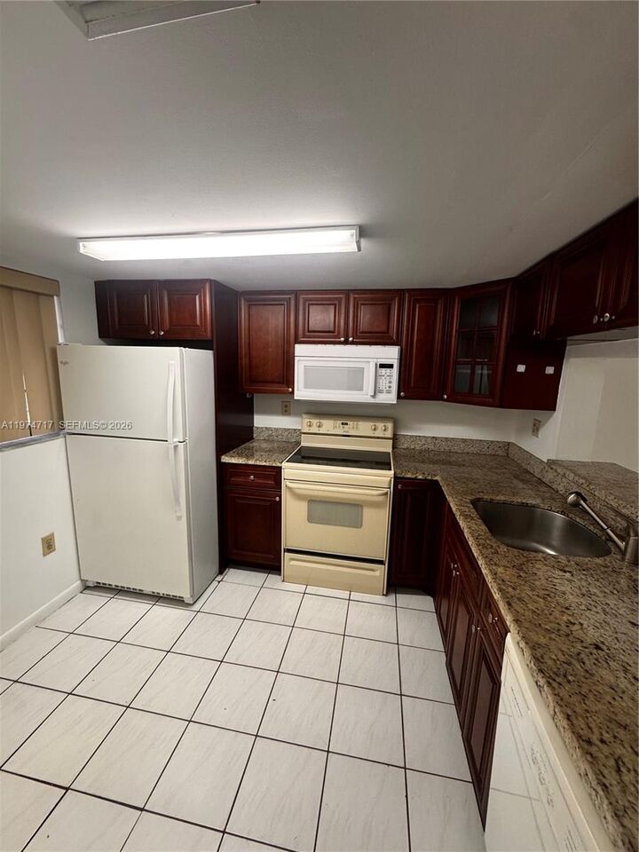 Property Photo:  10975 SW 107th St 202  FL 33176 