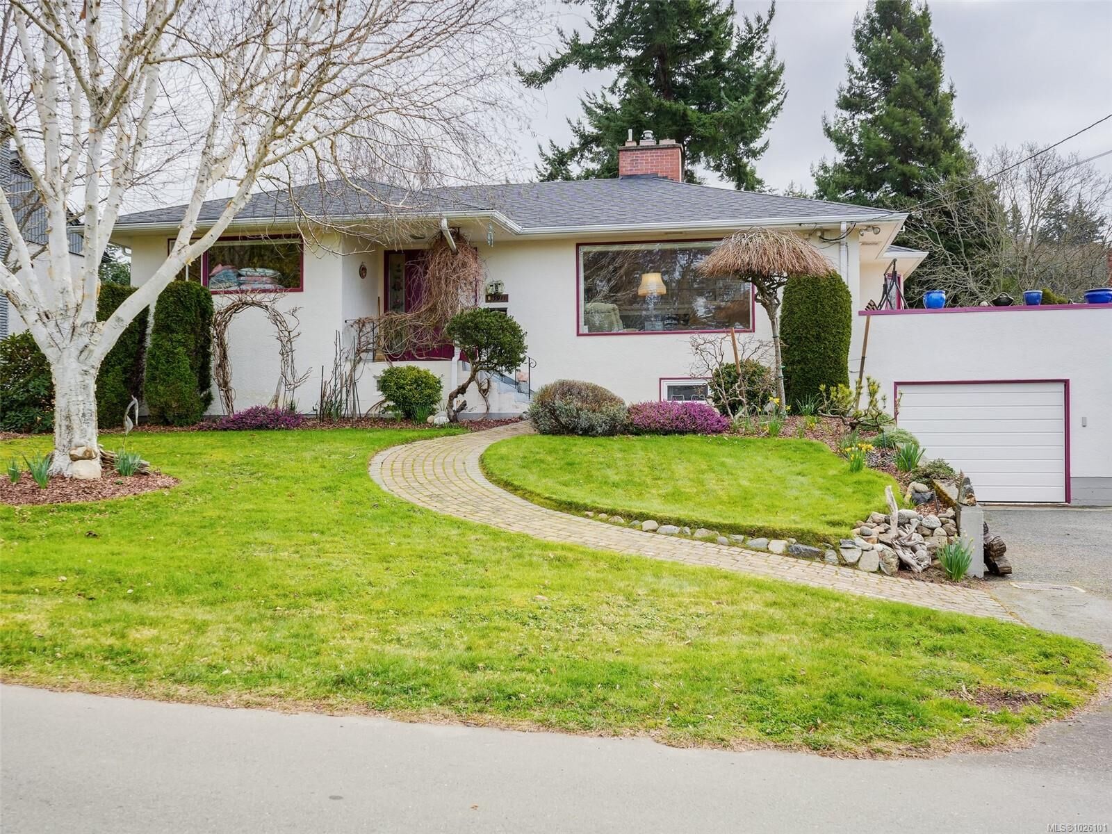 Property Photo:  3911 Dawe Rd  BC V8N 4H5 