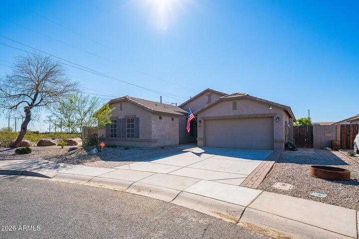 Property Photo:  25509 W Magnolia Street  AZ 85326 