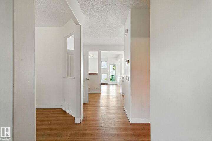 Property Photo: 7836 7 Avenue SW AB T6X 1N3
