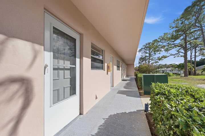 Property Photo:  18081 SE Country Club Drive 3-23  FL 33469 