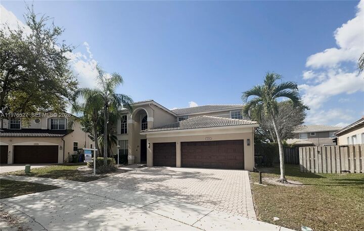Property Photo:  1104 NW 139th Ave  FL 33028 