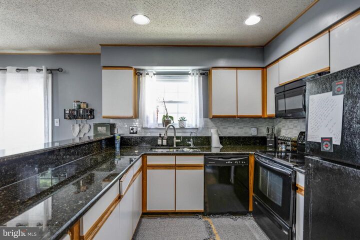 Property Photo:  8329 Founders Woods Way  MD 20744 