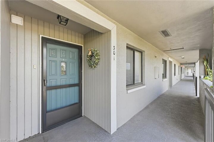 Property Photo:  5725 Gage Ln E301  FL 34113 