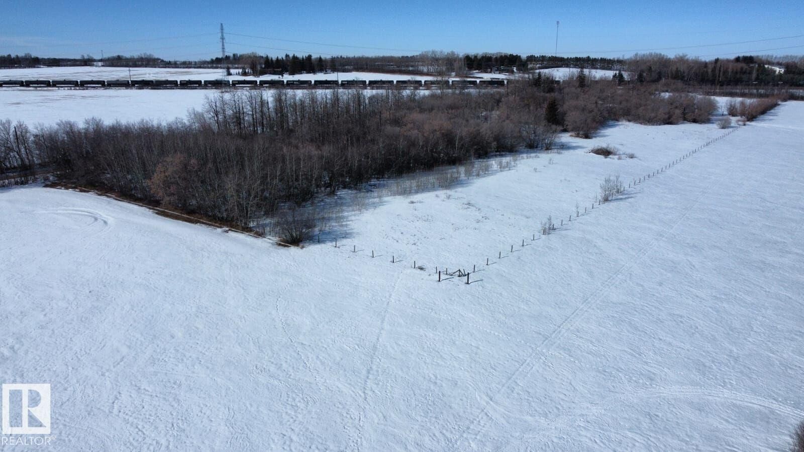 Property Photo:  19125 25 Street NE  AB T5Y 6K2 