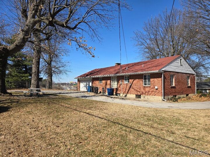 Property Photo:  7126 Forest Hill Drive  MO 63121 