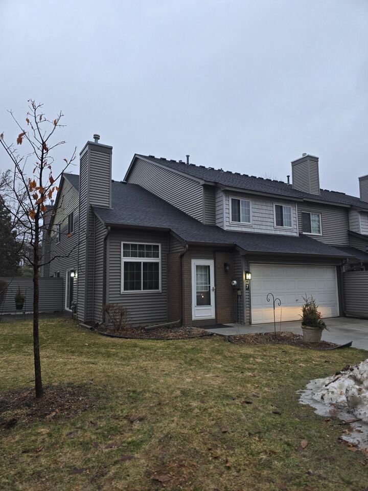Property Photo:  9935 Russell Avenue N 7  MN 55444 