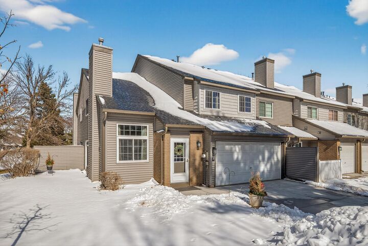 Property Photo:  9935 Russell Avenue N 7  MN 55444 